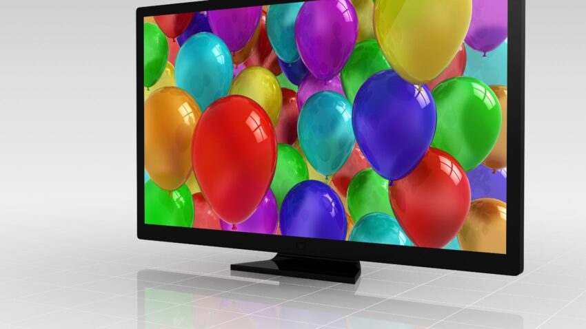 Matryca telewizora z balonikami w tle.
